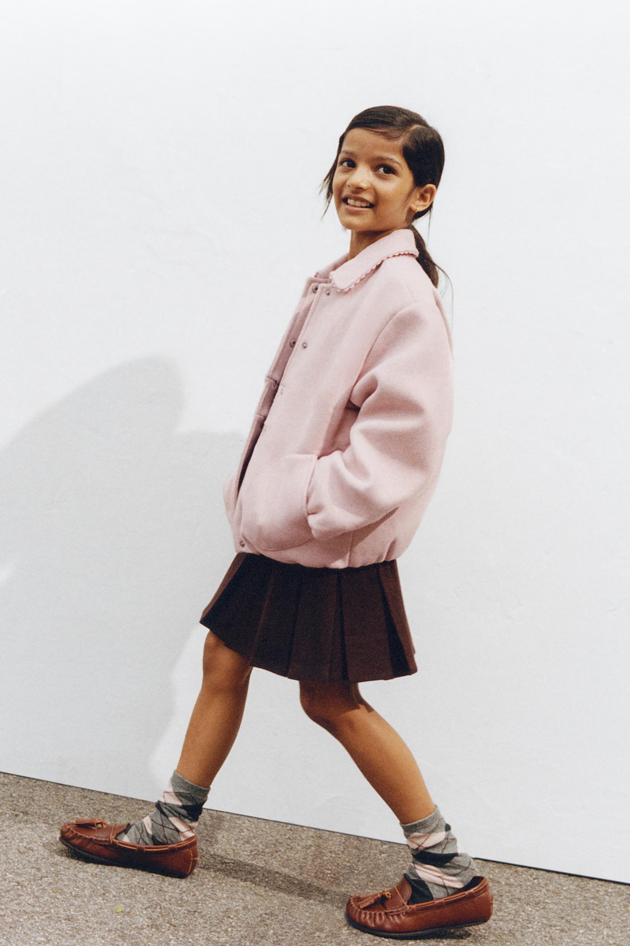 PLEATED KNIT SKIRT