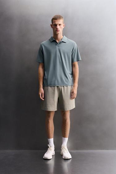 TECHNICAL PIQUÉ TRAINING POLO SHIRT - Light blue by Zara