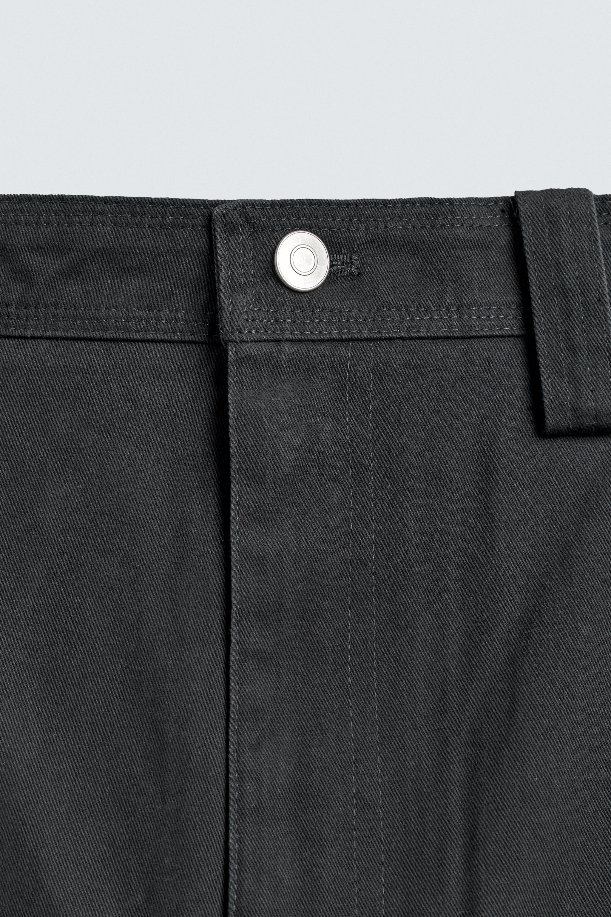 RELAXED FIT PANTS WITH TWISTED SEAM