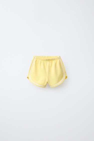 LOT DE DEUX SHORTS EN MOLLETON PARAPLUIES DE PLAGE ET ONDULINE - Imprimée de Zara - Image 1