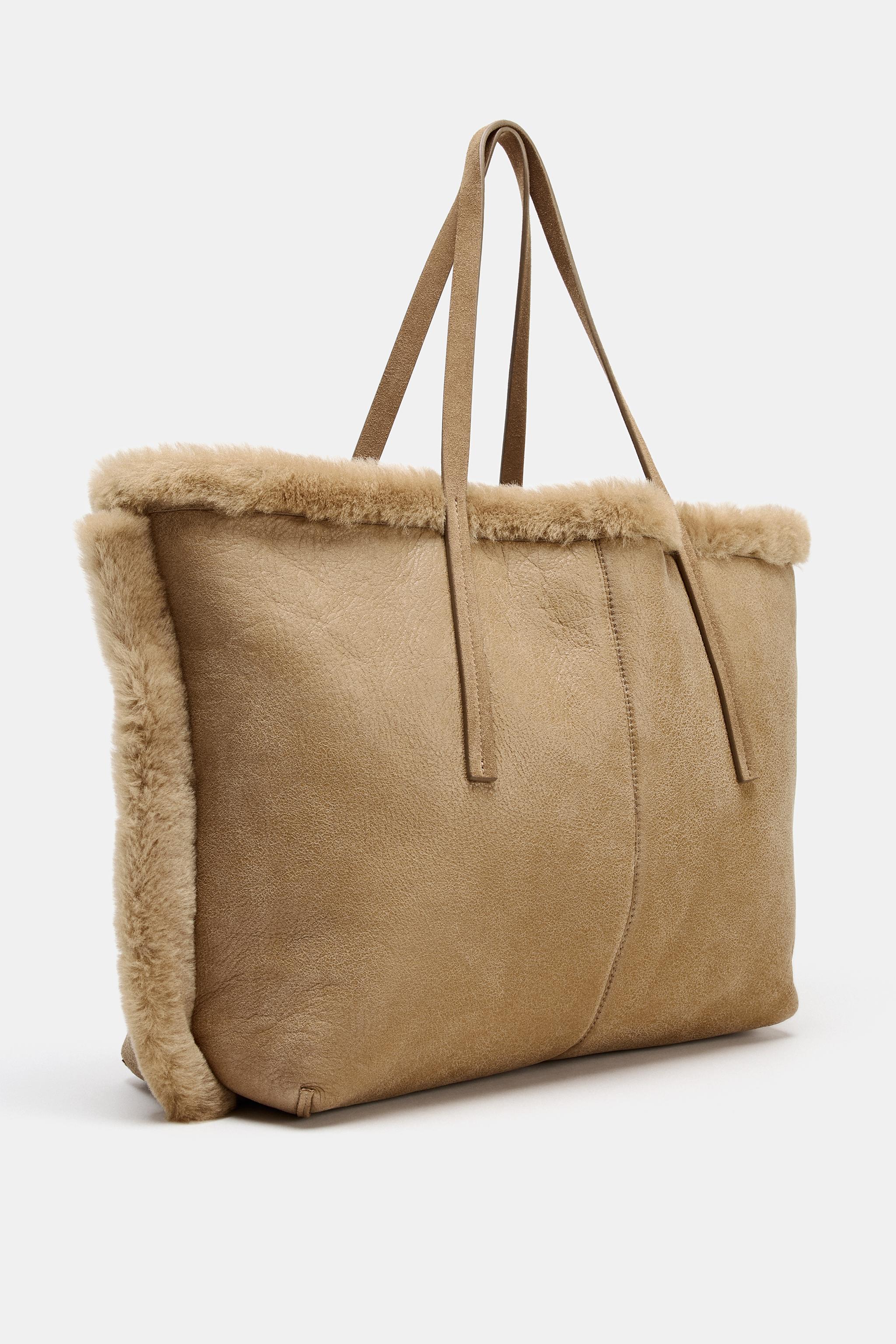 REVERSIBLE LEATHER BAG