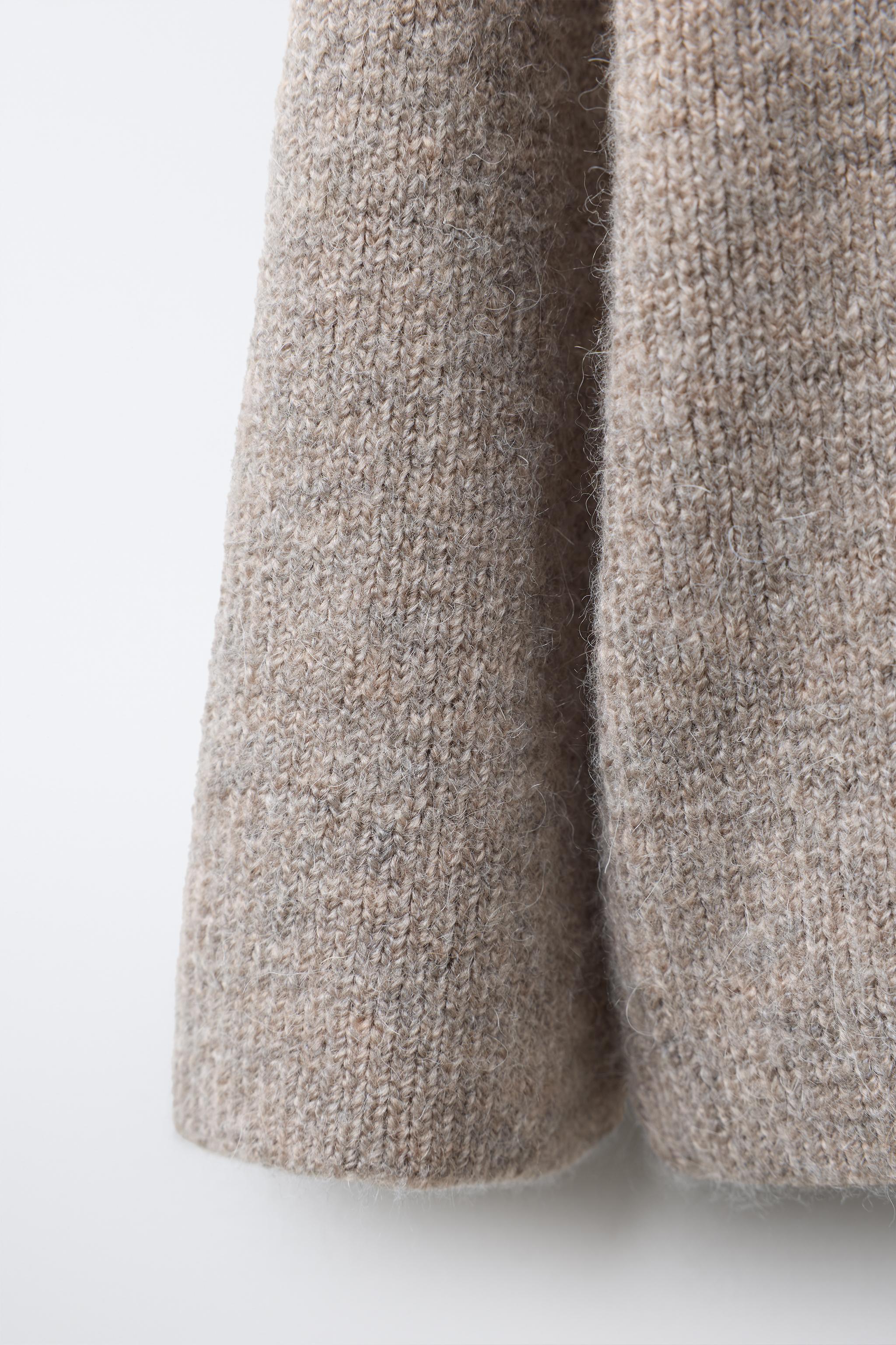 PULL EN MAILLE À COL TUNISIEN