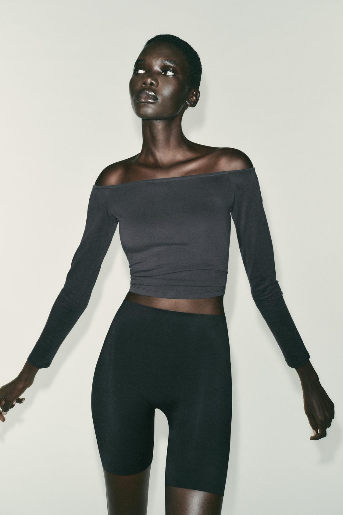 RIB TOP WITH FLARED SLEEVES