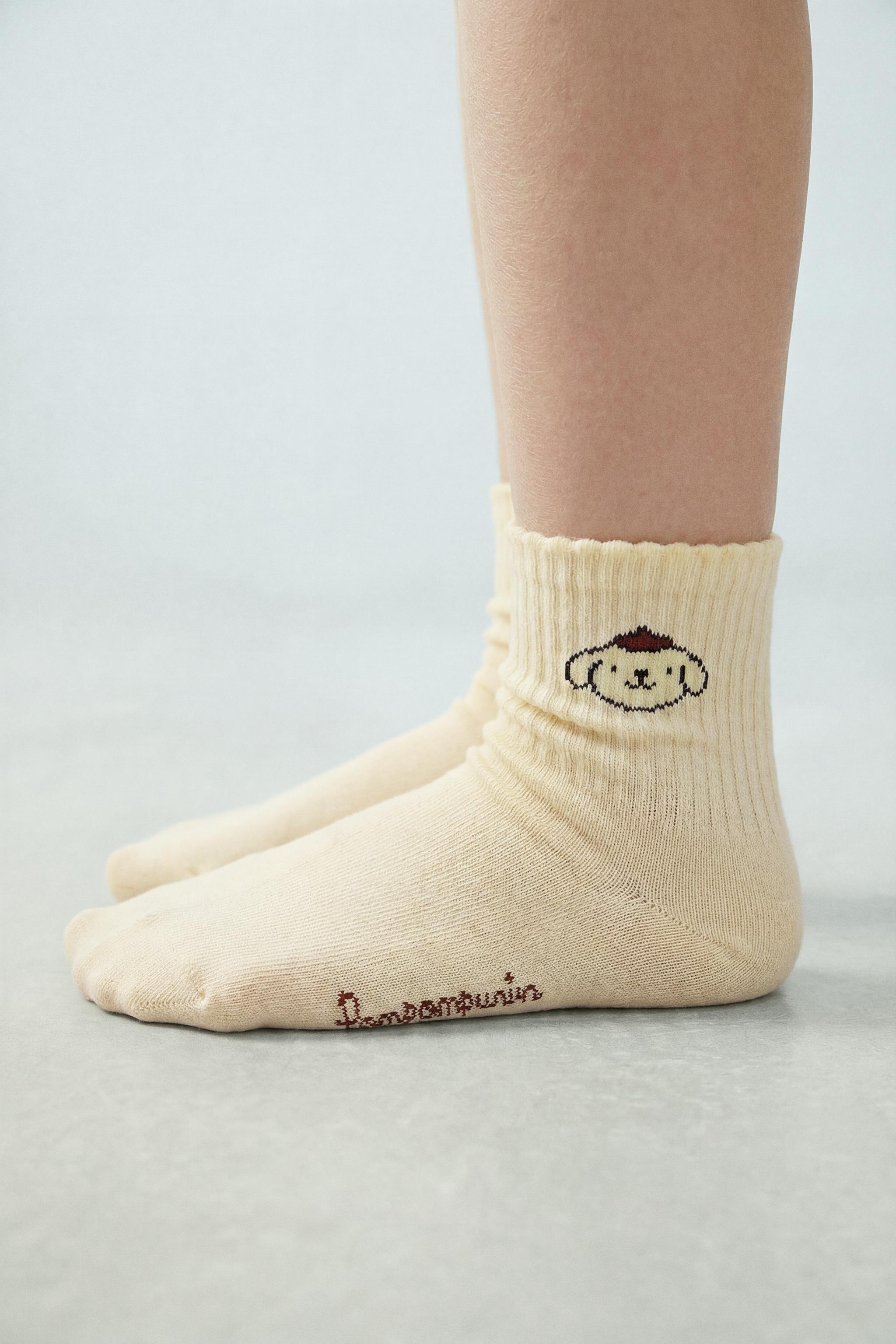 THREE-PACK OF HELLO KITTY AND FRIENDS © SANRIO MID-CALF SOCKS