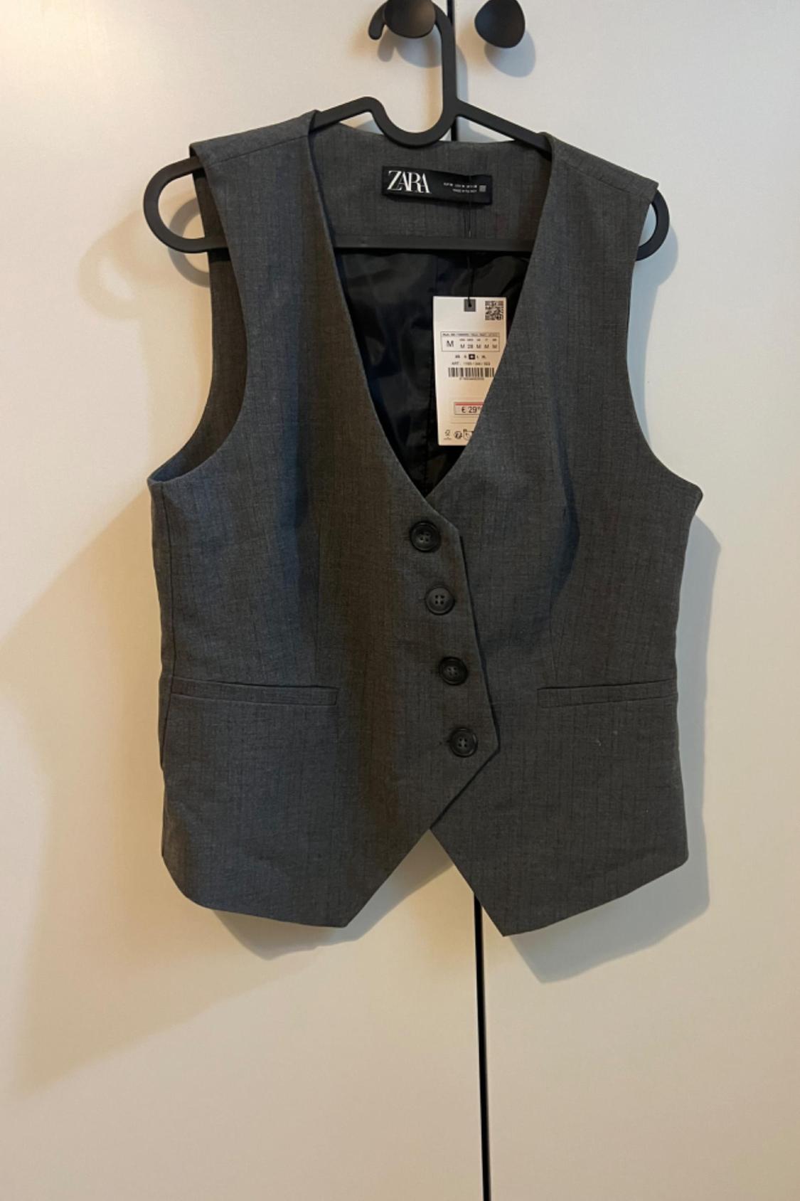 TAILORED WAISTCOAT WITH ASYMMETRIC FASTENING
