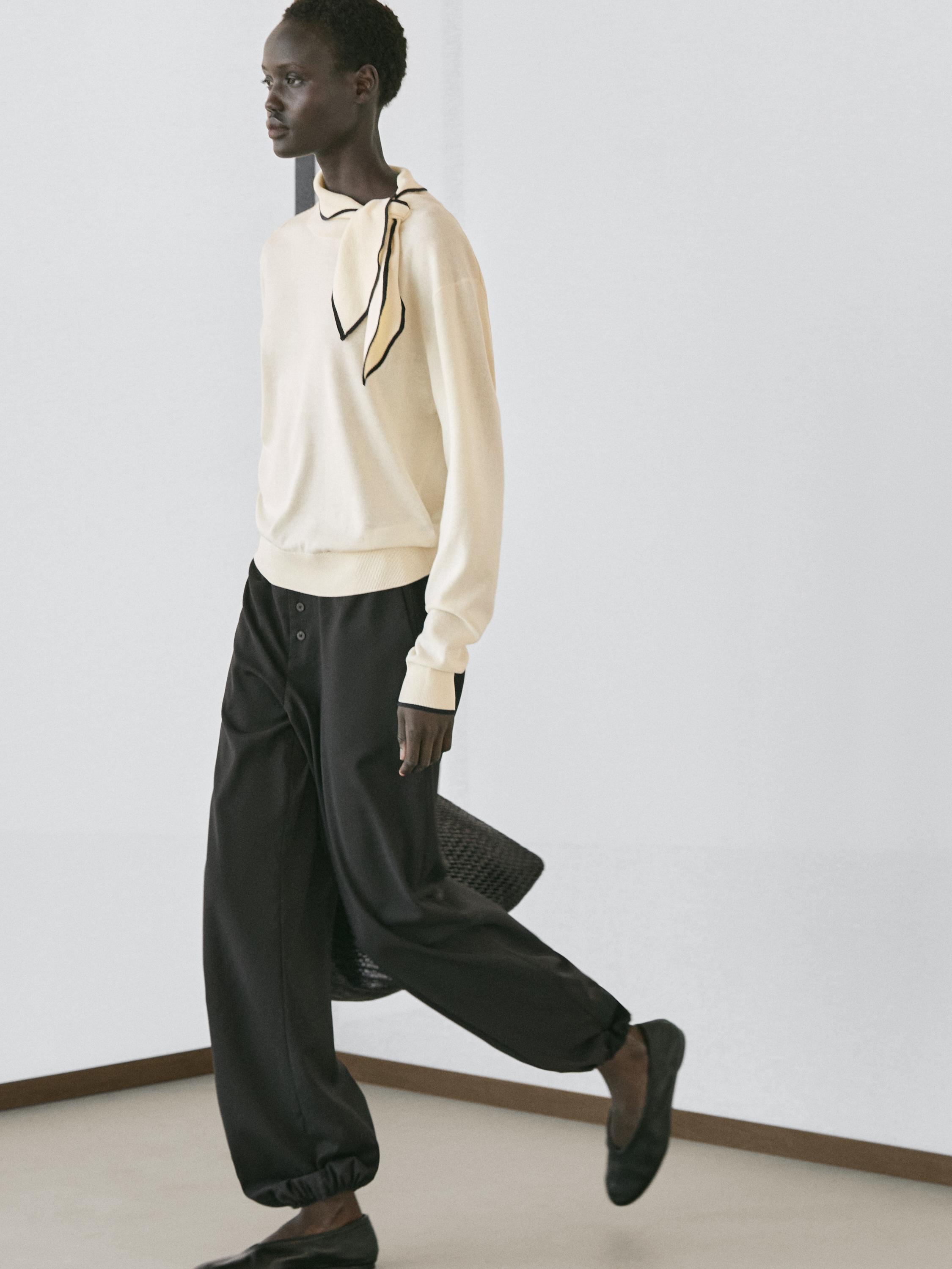 100% cotton knit sweater with scarf detail