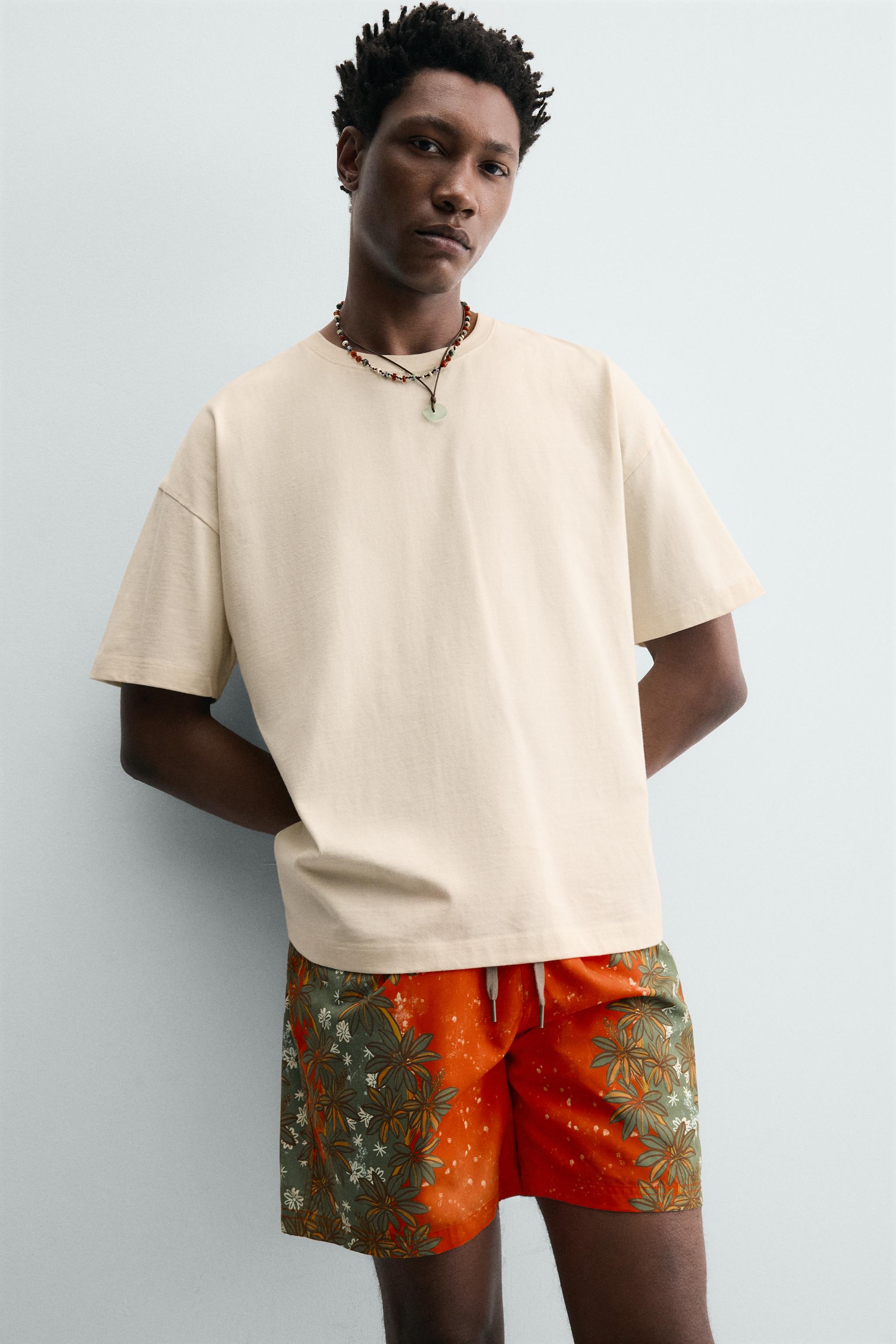 LONG FLORAL PRINT SWIM TRUNKS