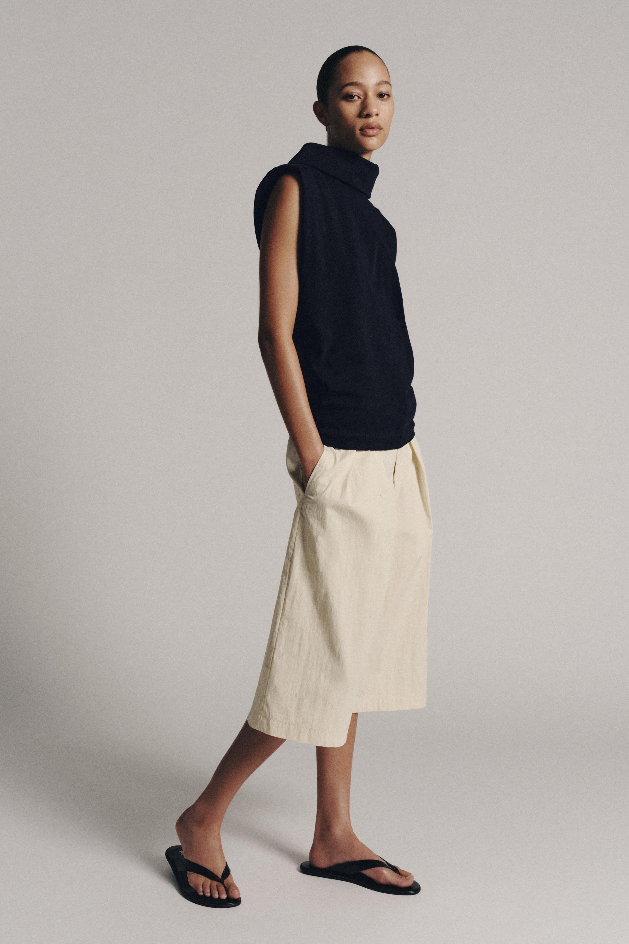 High-Neck Top with Shoulder Pads — Navy blue