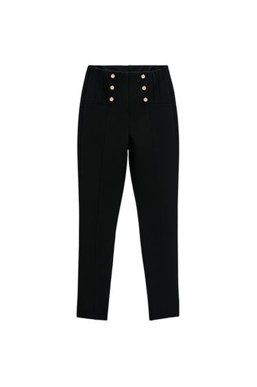 LEGGINGS WITH METAL BUTTONS