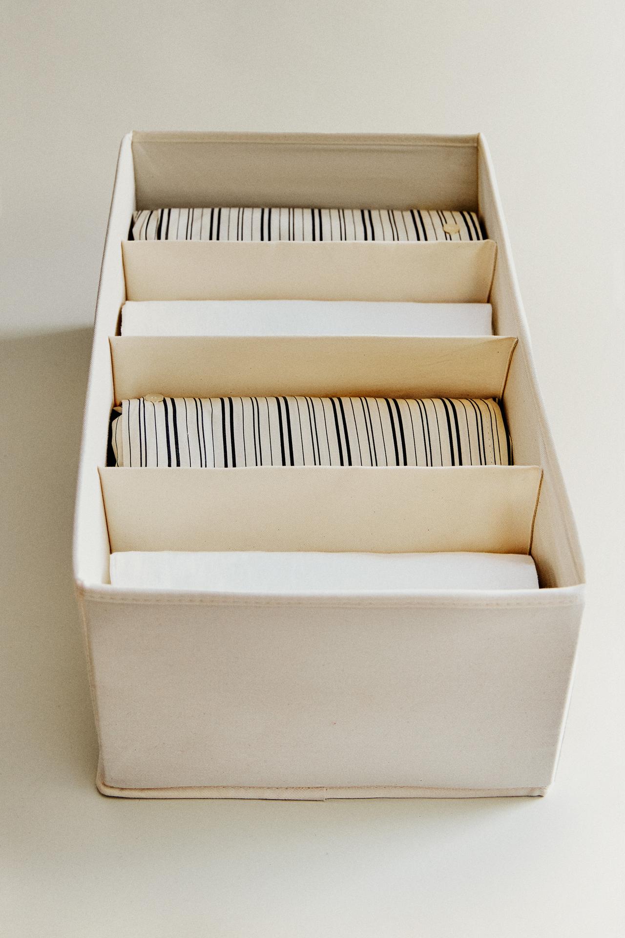 TEXTILE TROUSERS ORGANIZER — Light beige