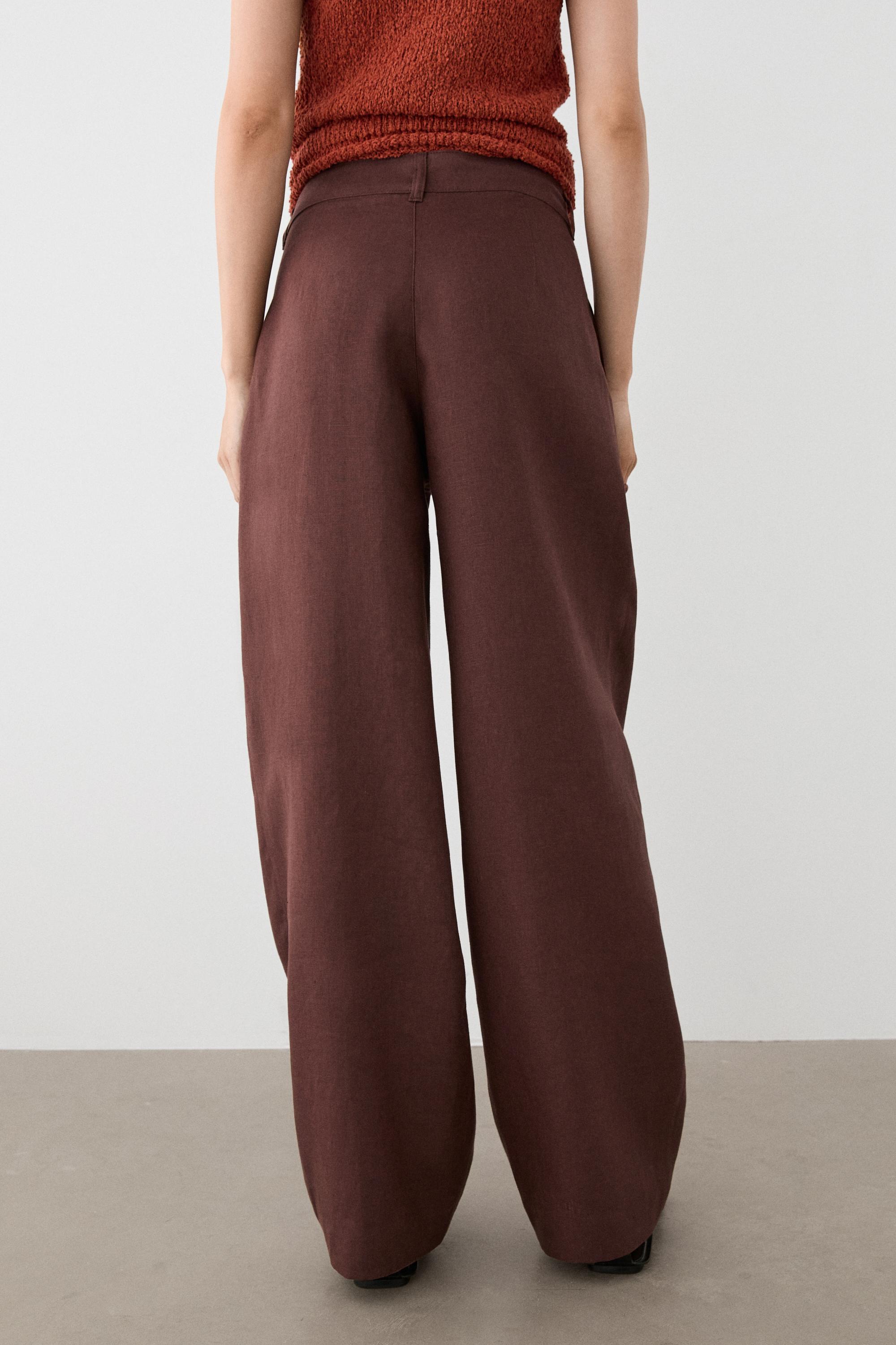 Wide-leg pleated linen trousers