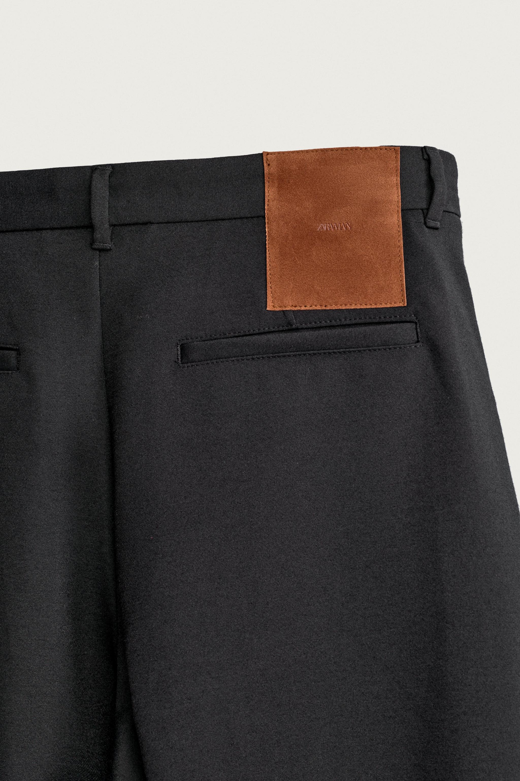WIDE FIT PLEATED BERMUDA SHORTS
