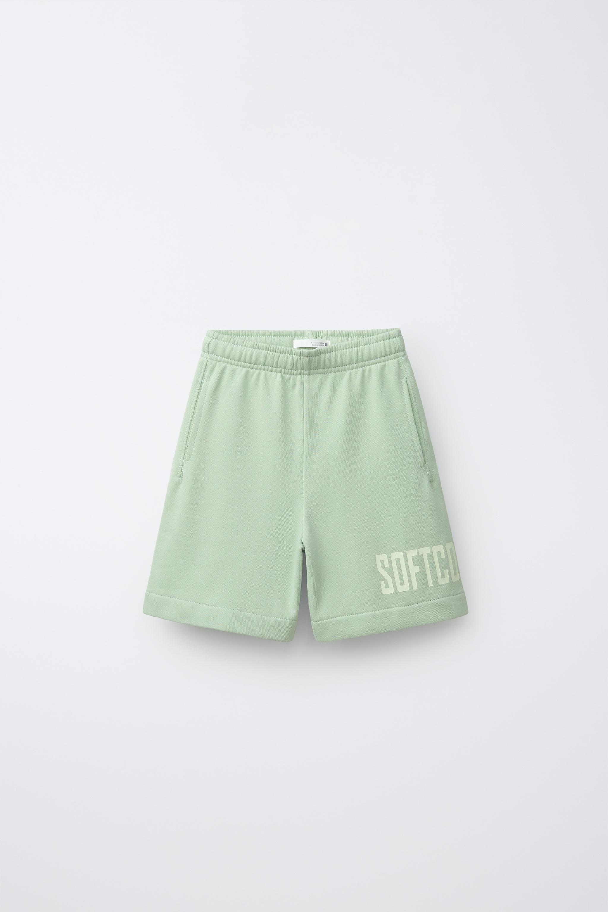 SHORT DE JOGGING À INSCRIPTION