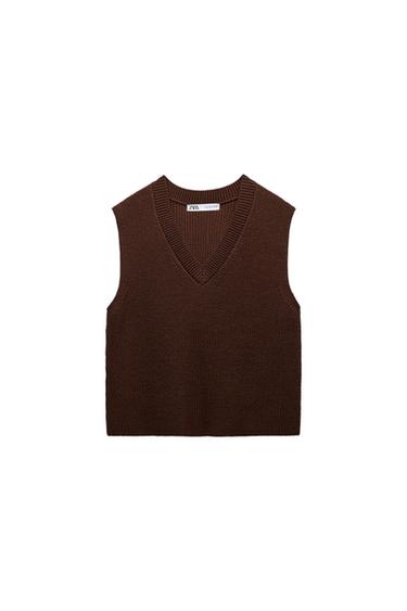 Brown sleeveless V-neck knitted vest. Visible label with the text "ZARA". White background.