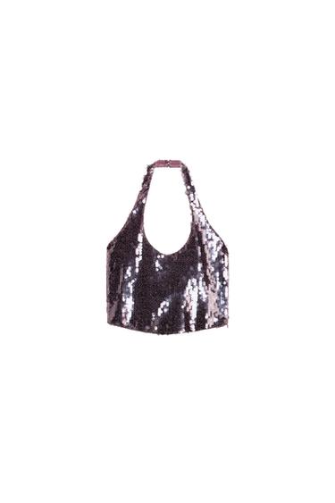 Front view of a short lilac halter neck sequined top. Open back and bare shoulders.
