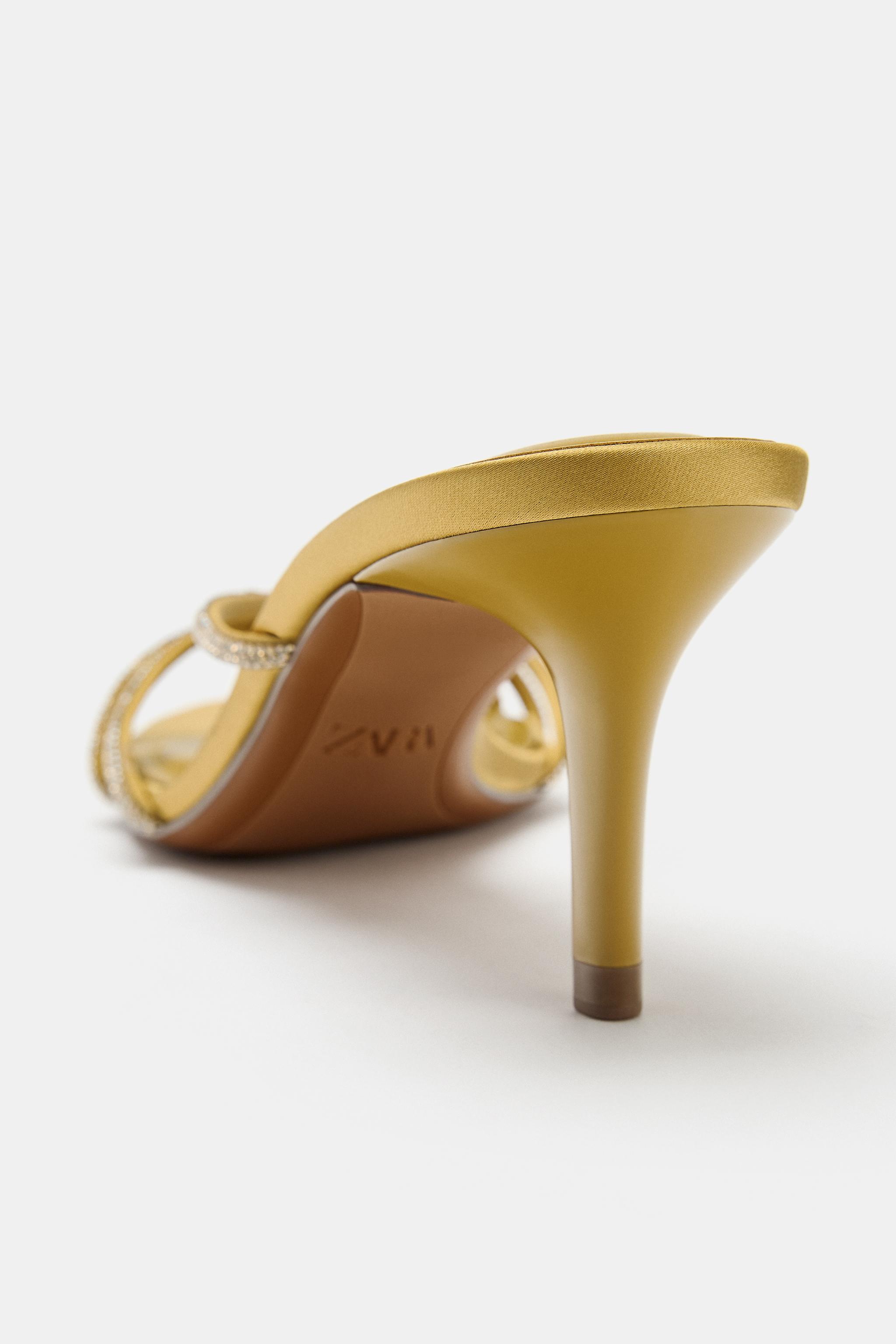 HEELED SANDALS WITH APPLIQUÉS