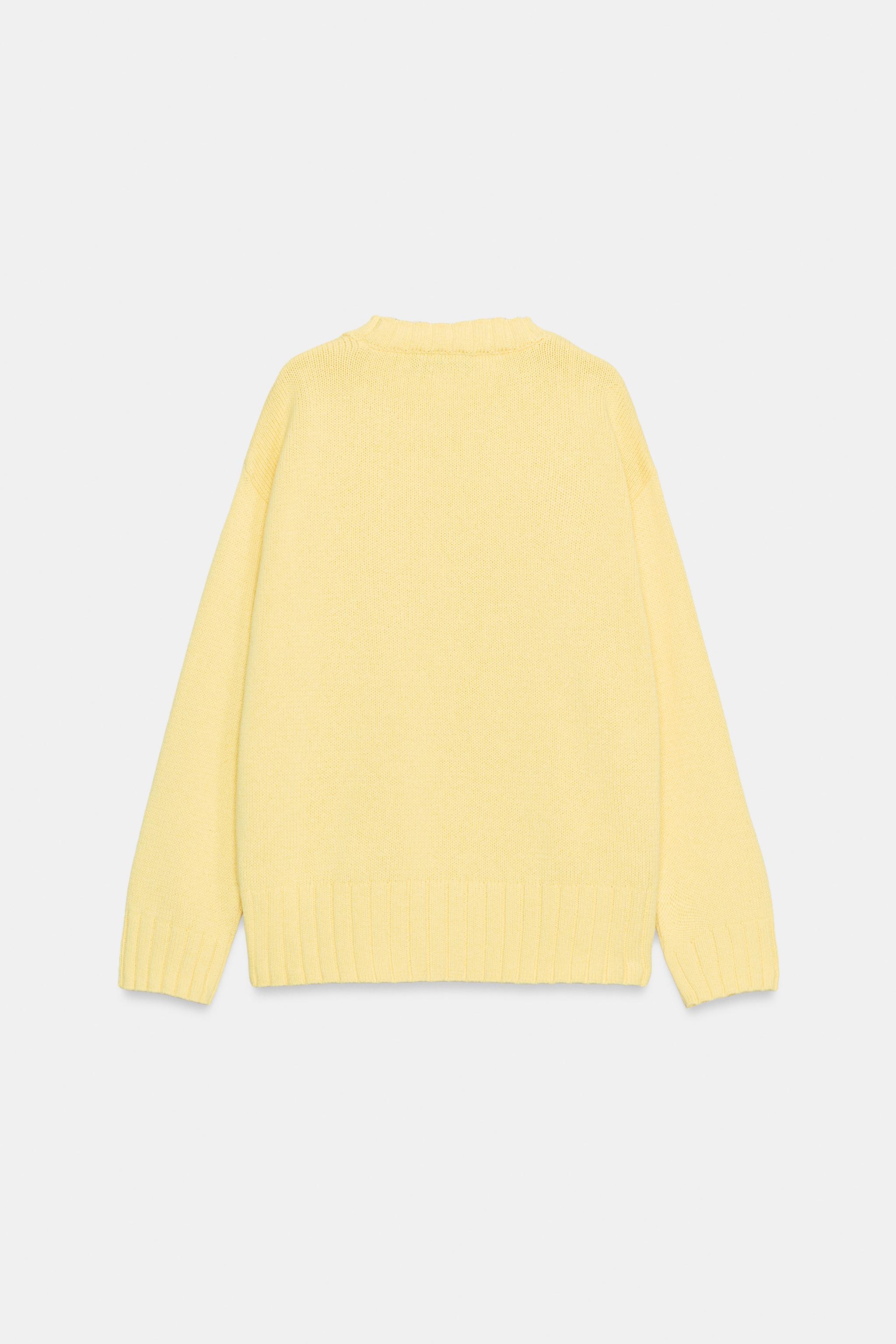 ASYMMETRIC HEM KNIT SWEATER