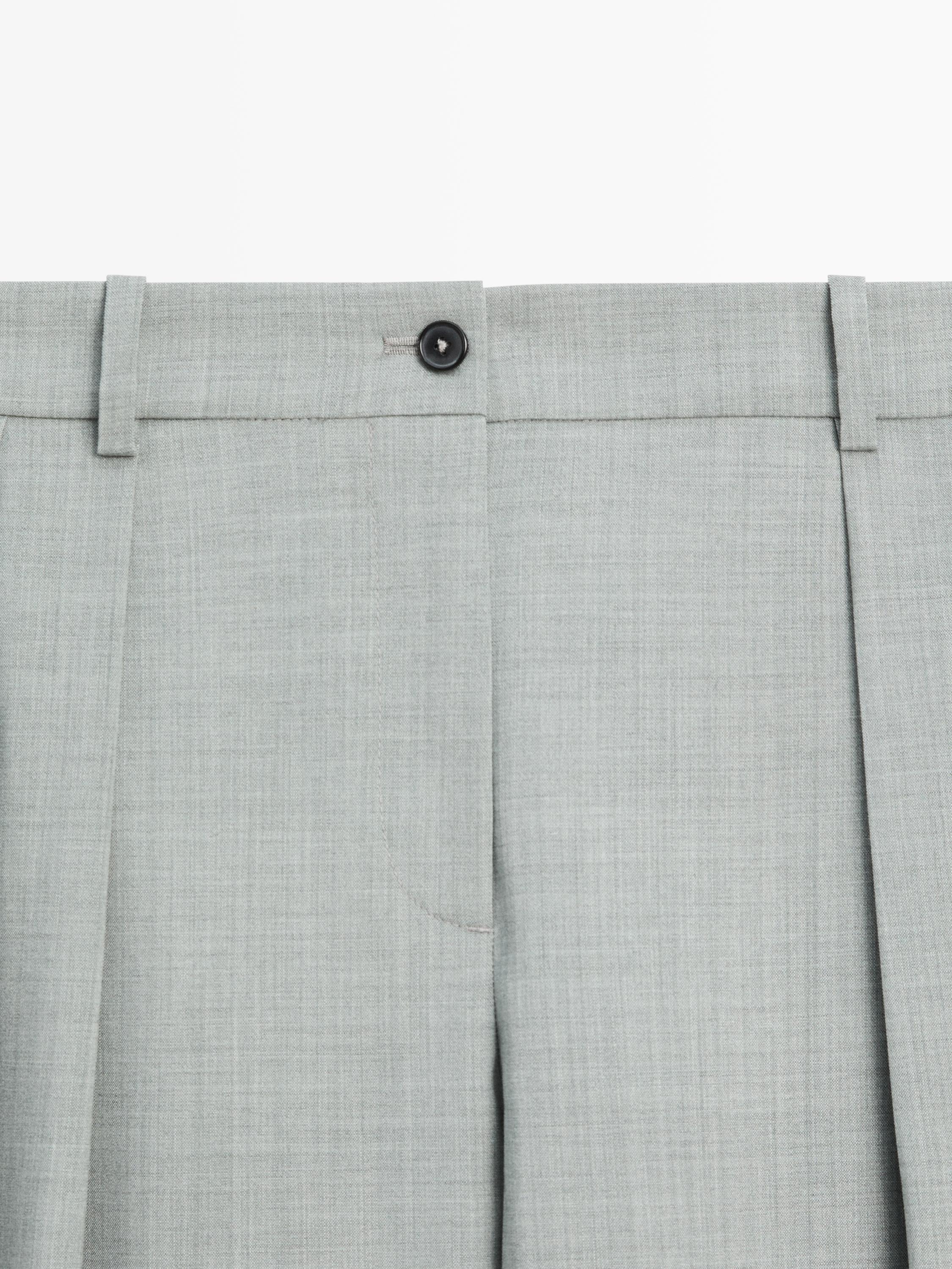 Flowing trousers with darts