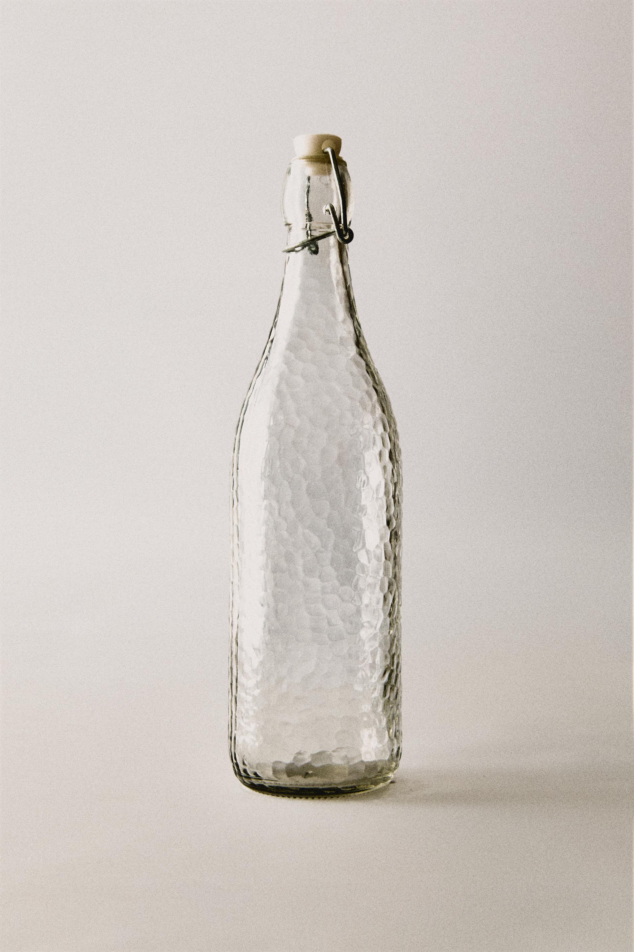 BOTTLE WITH CERAMIC STOPPER — Transparent