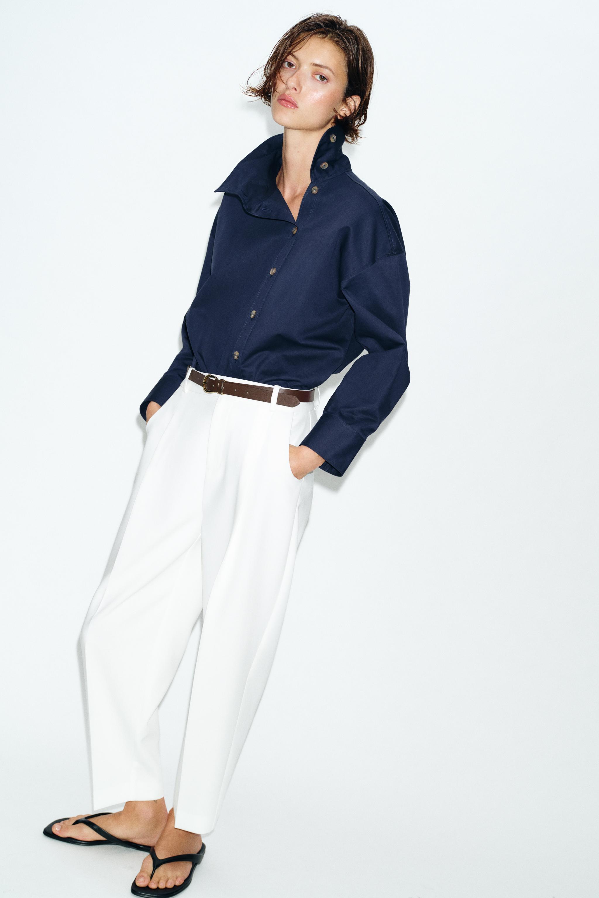 PANTALON À PINCES ET CEINTURE