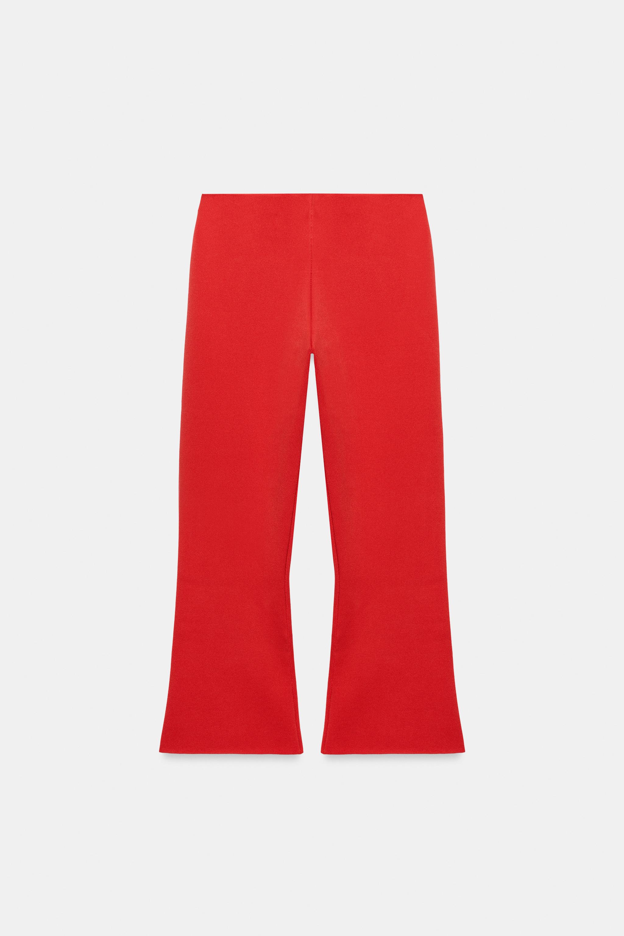 KNIT FLARE TROUSERS — Coral red