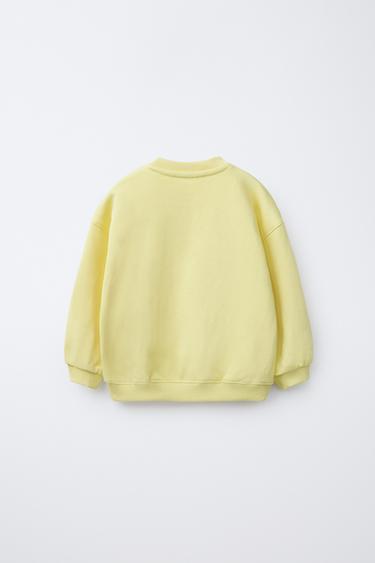 SWEATSHIRT WITH RAISED SLOGAN - Light yellow by Zara - Image 1