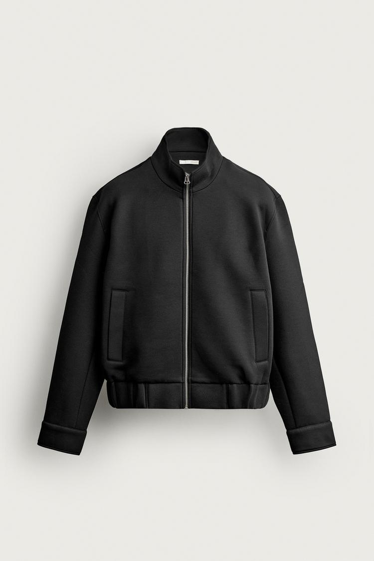 TECHNICAL RELAXED FIT JACKET