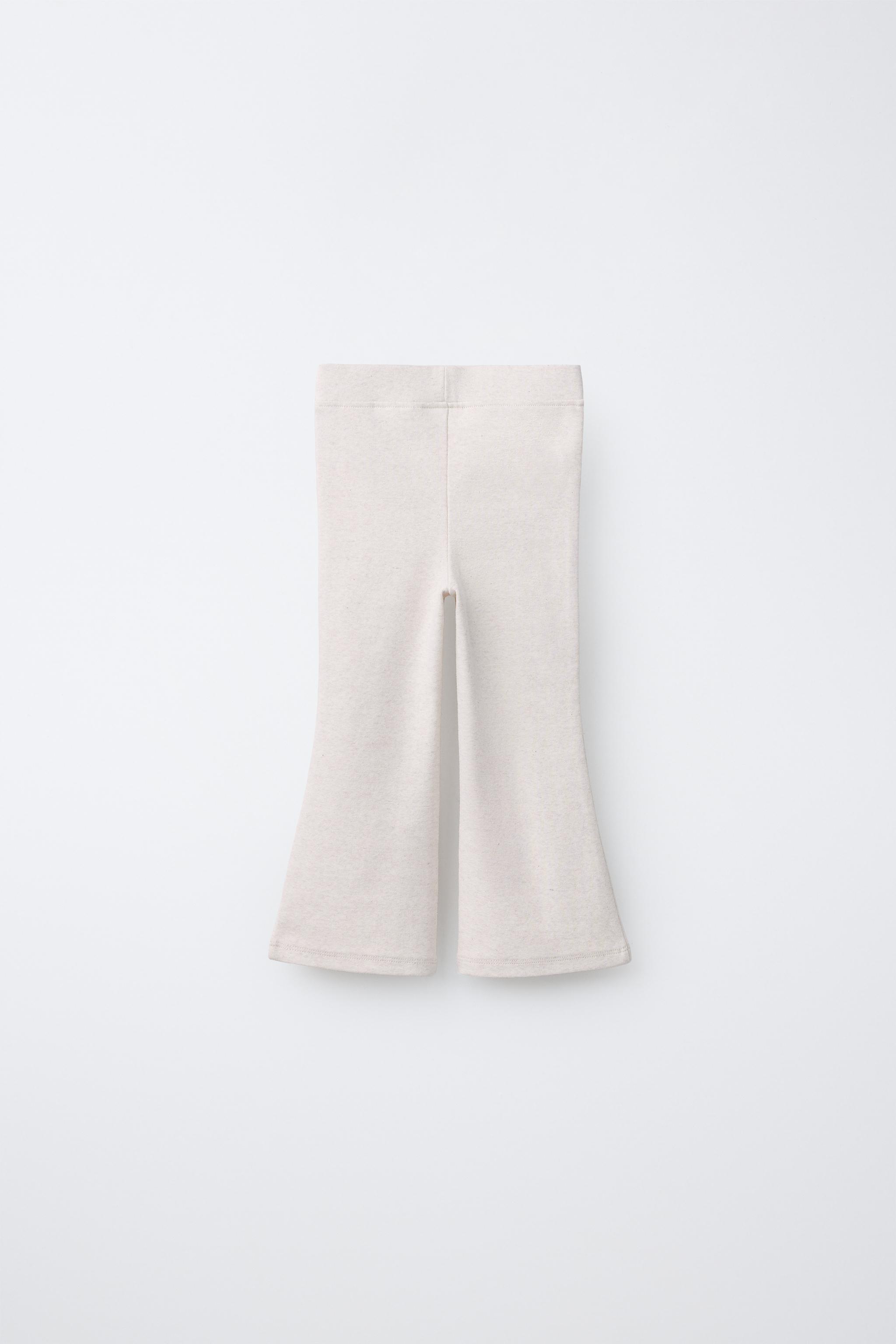LABEL DETAIL INTERLOCK FLARE LEGGINGS
