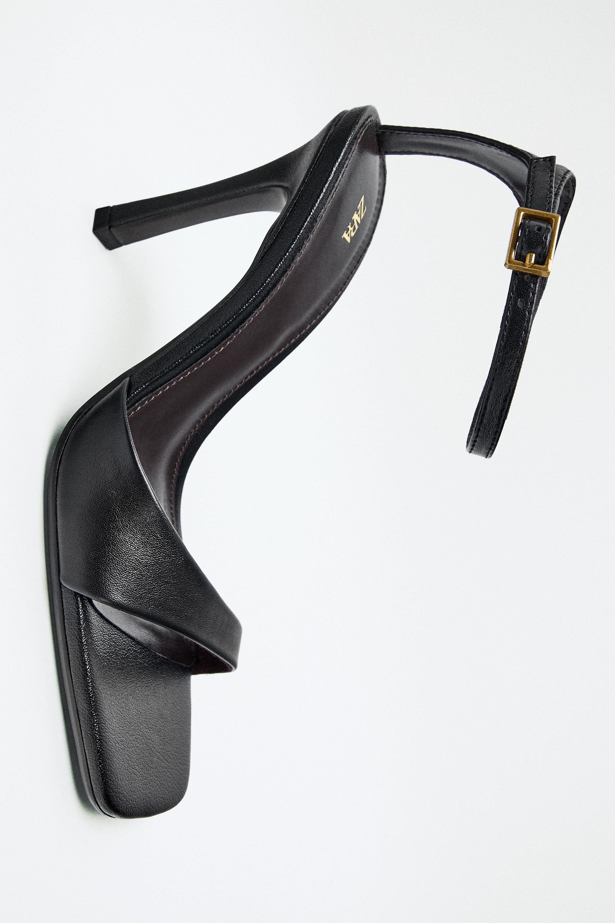 ASYMMETRIC LEATHER HEELED SANDALS
