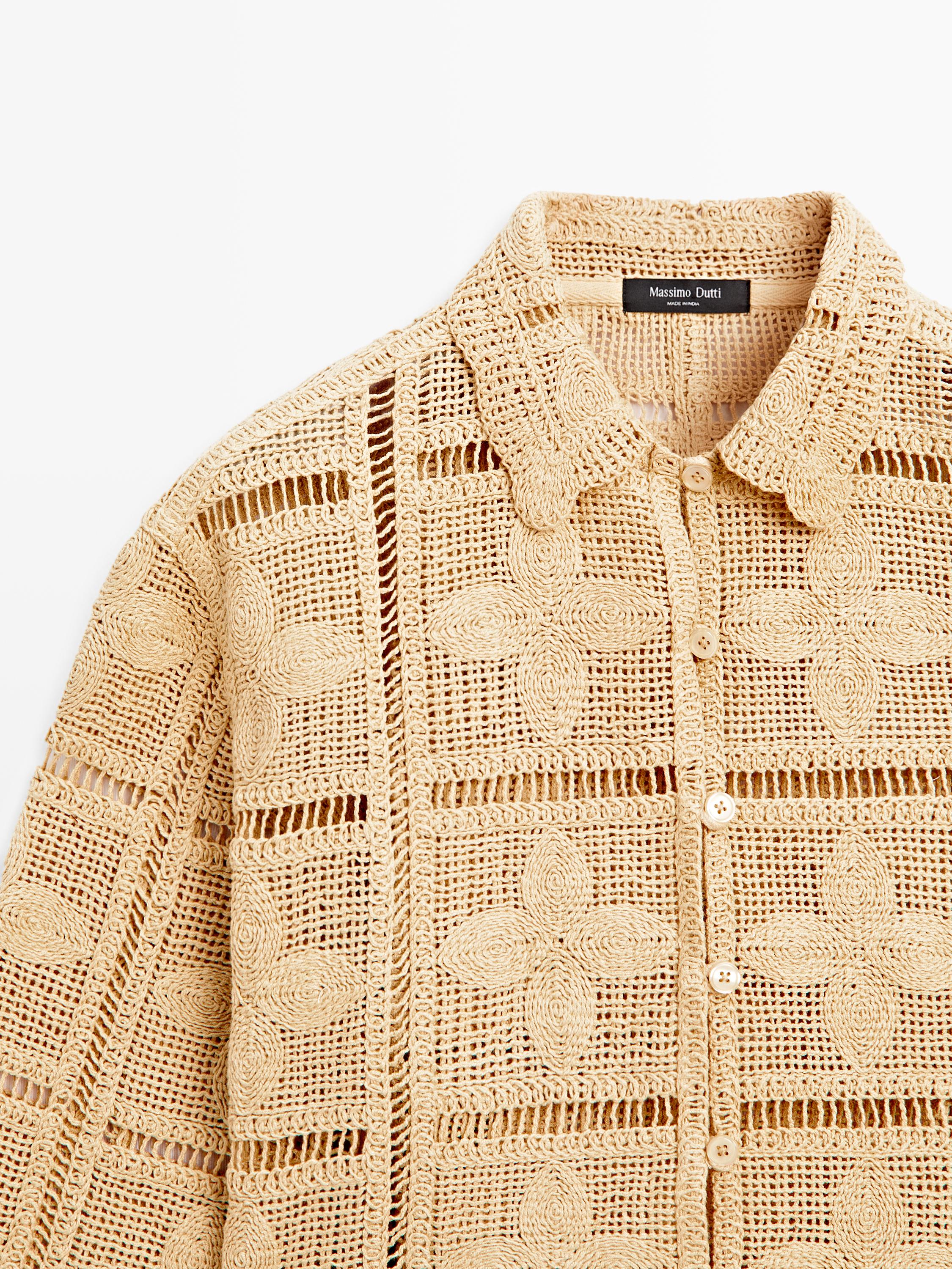 Veste en maille ajourée au crochet