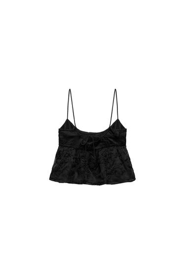 TEXTURED CAMISOLE TOP WITH FLORAL DETAIL