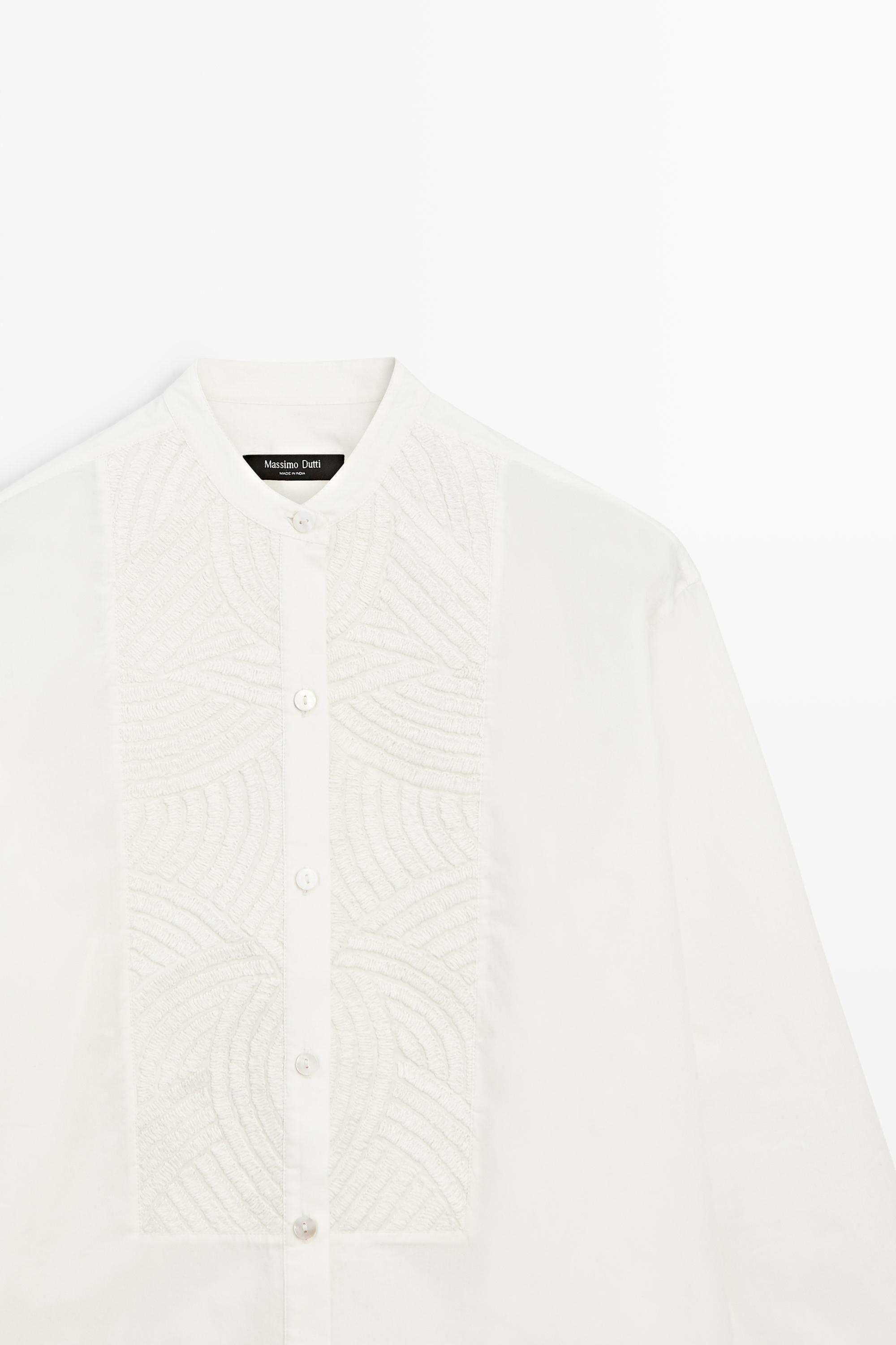 100% cotton poplin shirt with embroidered bib