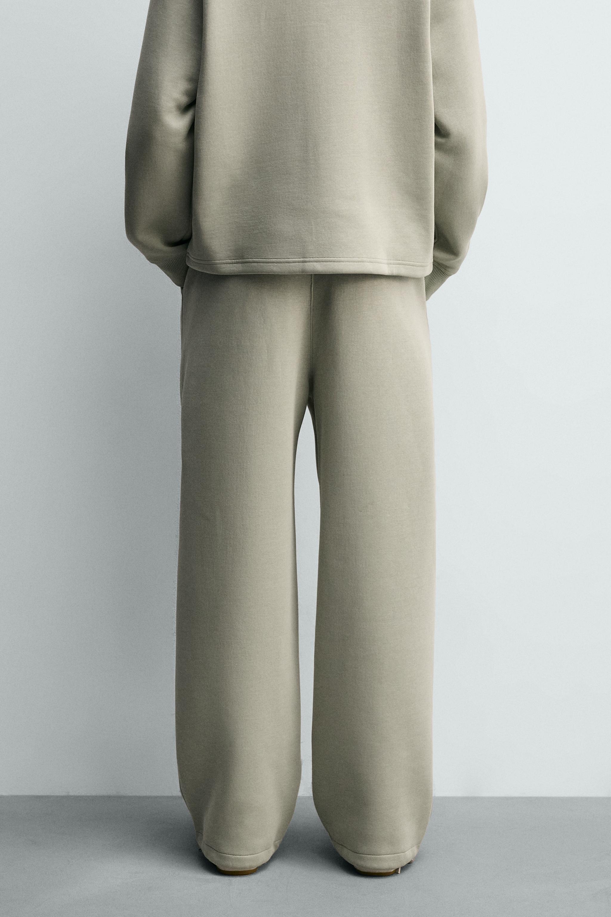 RELAXED FIT INTERLOCK JOGGING PANTS
