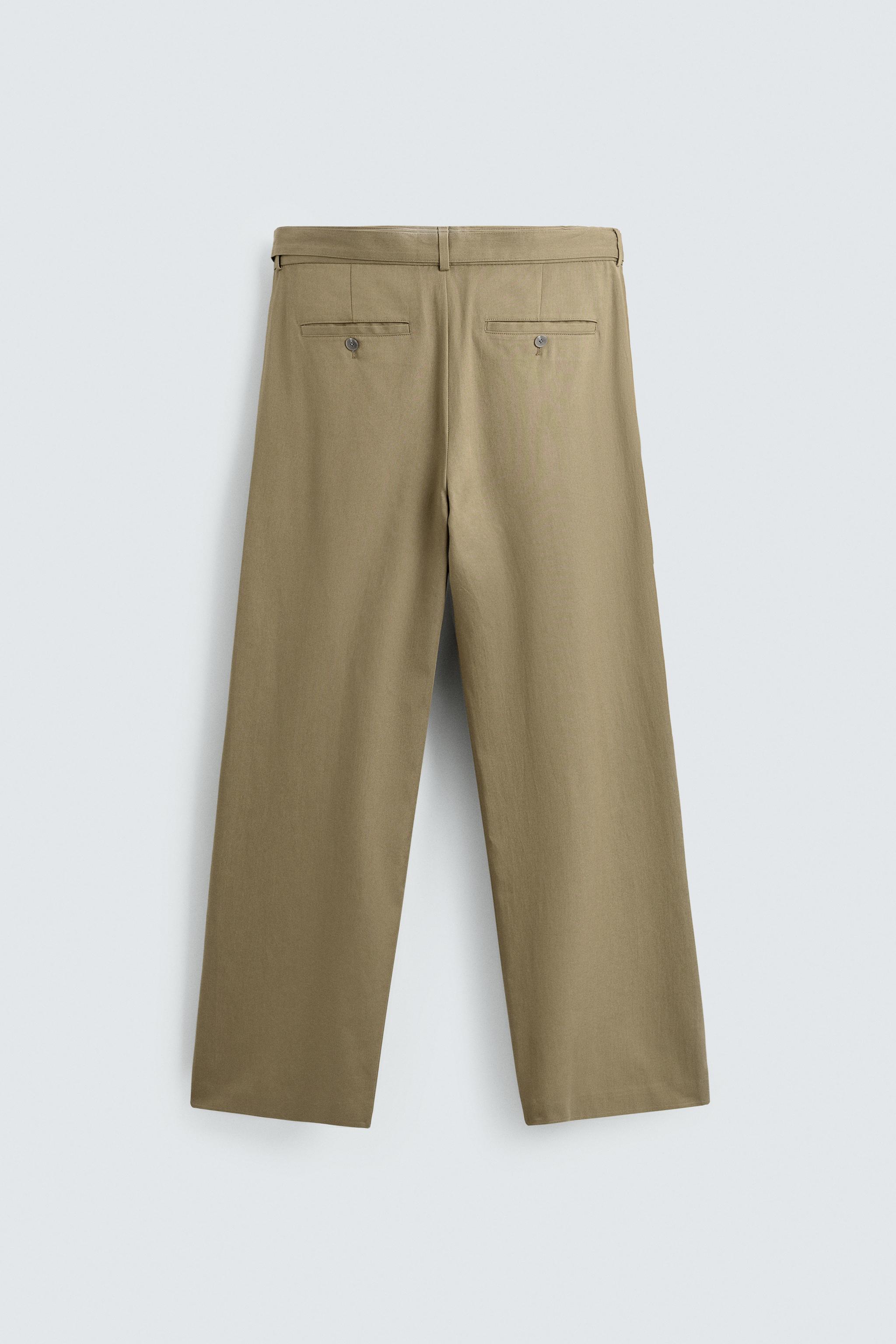 FLOWY PLEATED BELTED PANTS