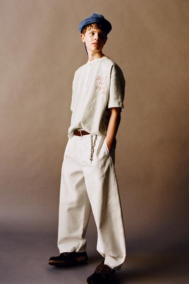 STRIPED T-SHIRT WITH LABEL - striped by Zara