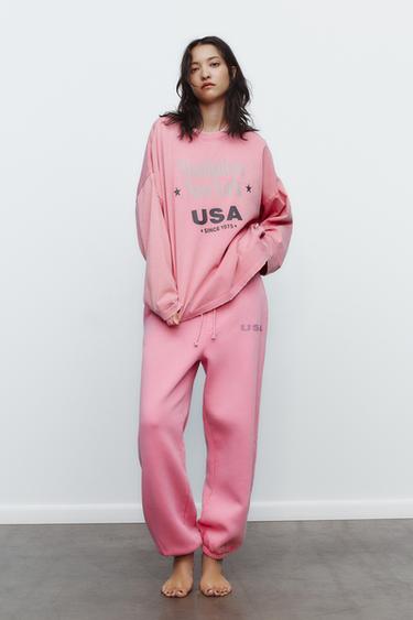 PANTALON EN MOLLETON EFFET DÉLAVÉ À INSCRIPTION - Rose de Zara
