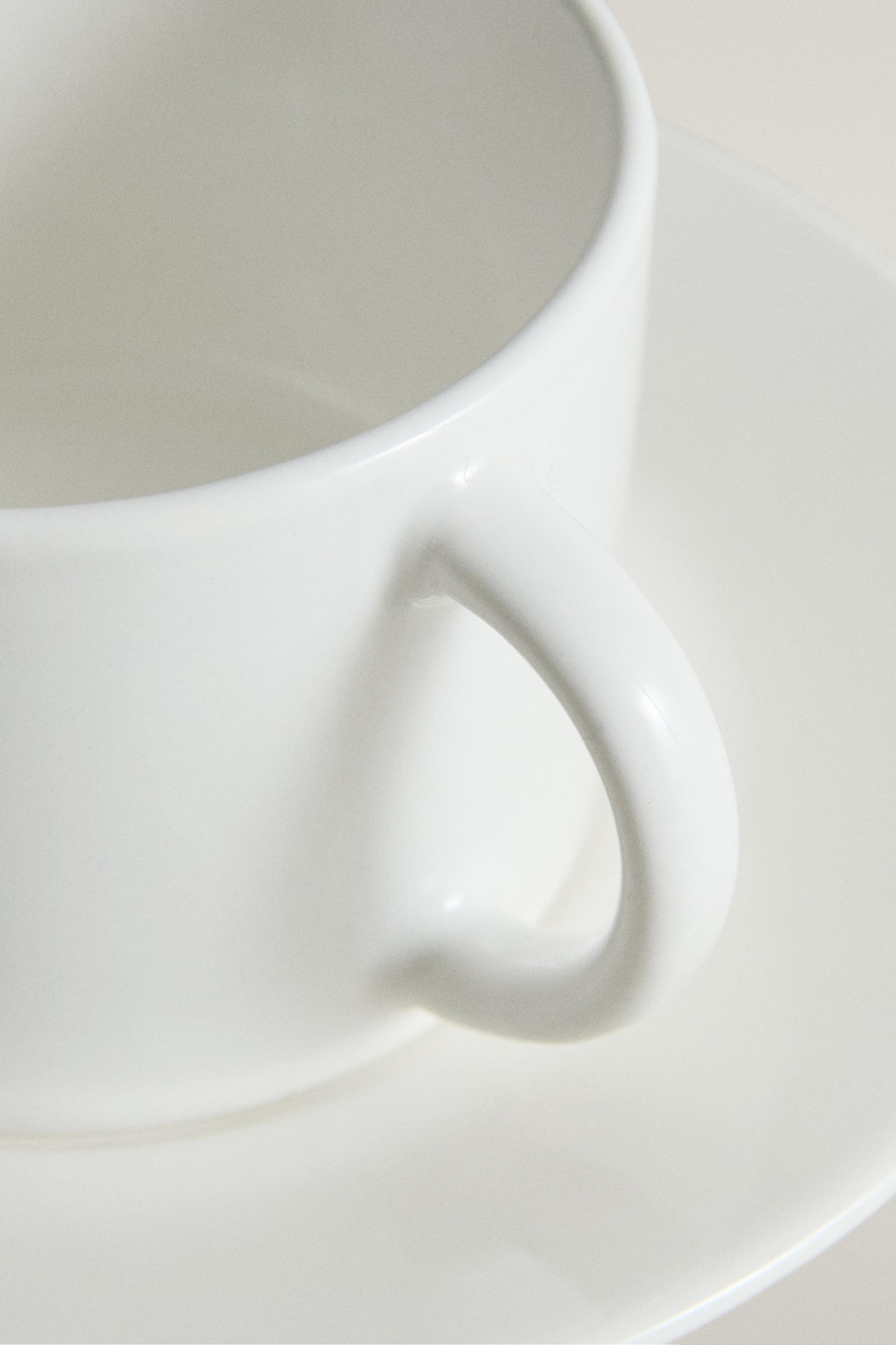 STONEWARE TEACUP