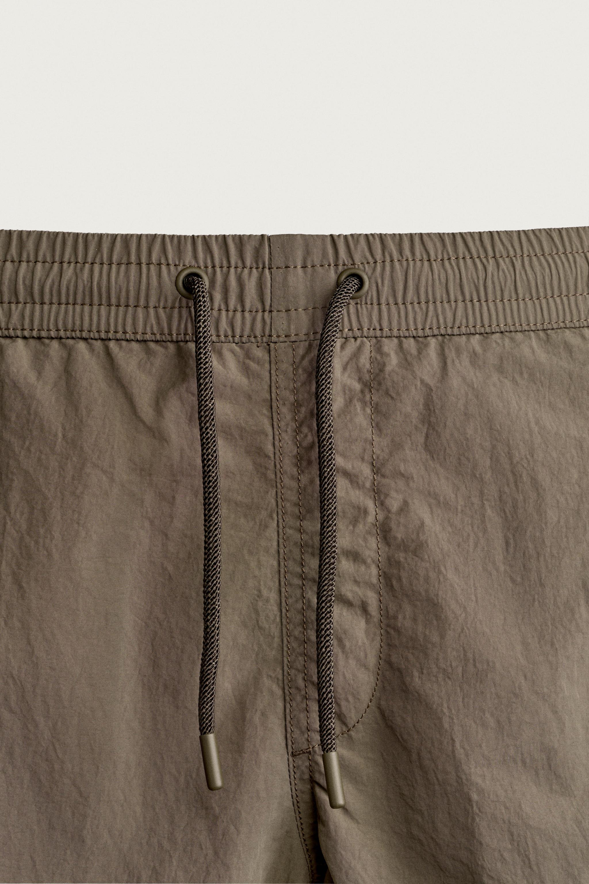 BASIC MID-LENGTH SWIM TRUNKS