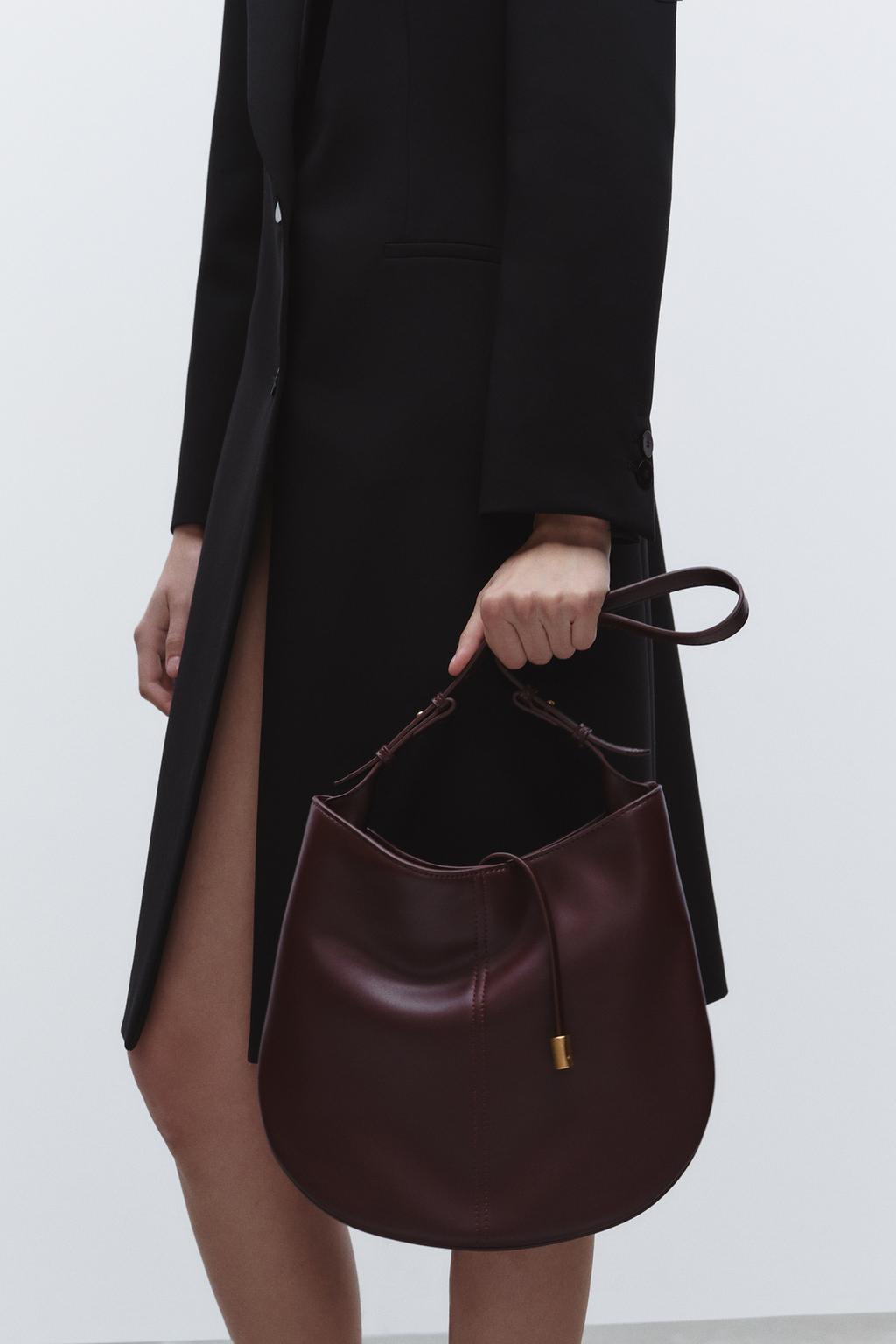 BUCKET BAG WITH HANGER DETAIL