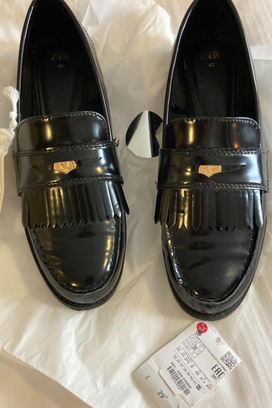 FLAT LOAFERS WITH METAL DETAIL