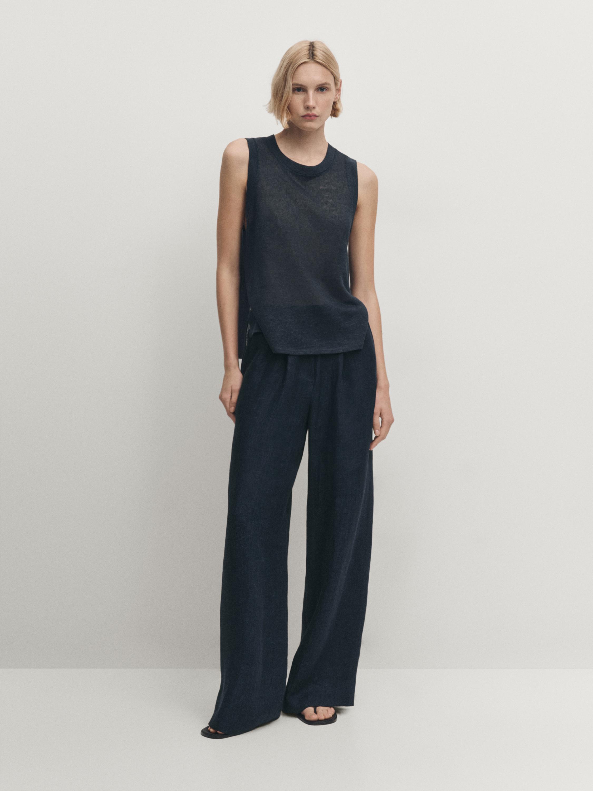 Sleeveless top with vent detail