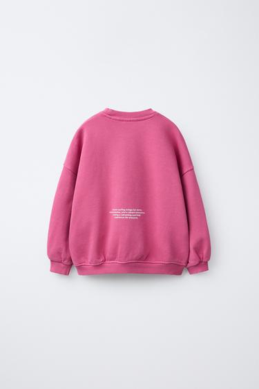 SWEATSHIRT WITH PRINTED SLOGAN - Fuchsia by Zara - Image 1
