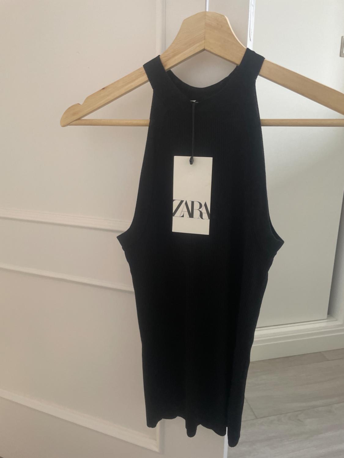 ΠΛΕΚΤΟ ΤΟΠ ΜΕ ΛΑΙΜΟΚΟΨΗ HALTER