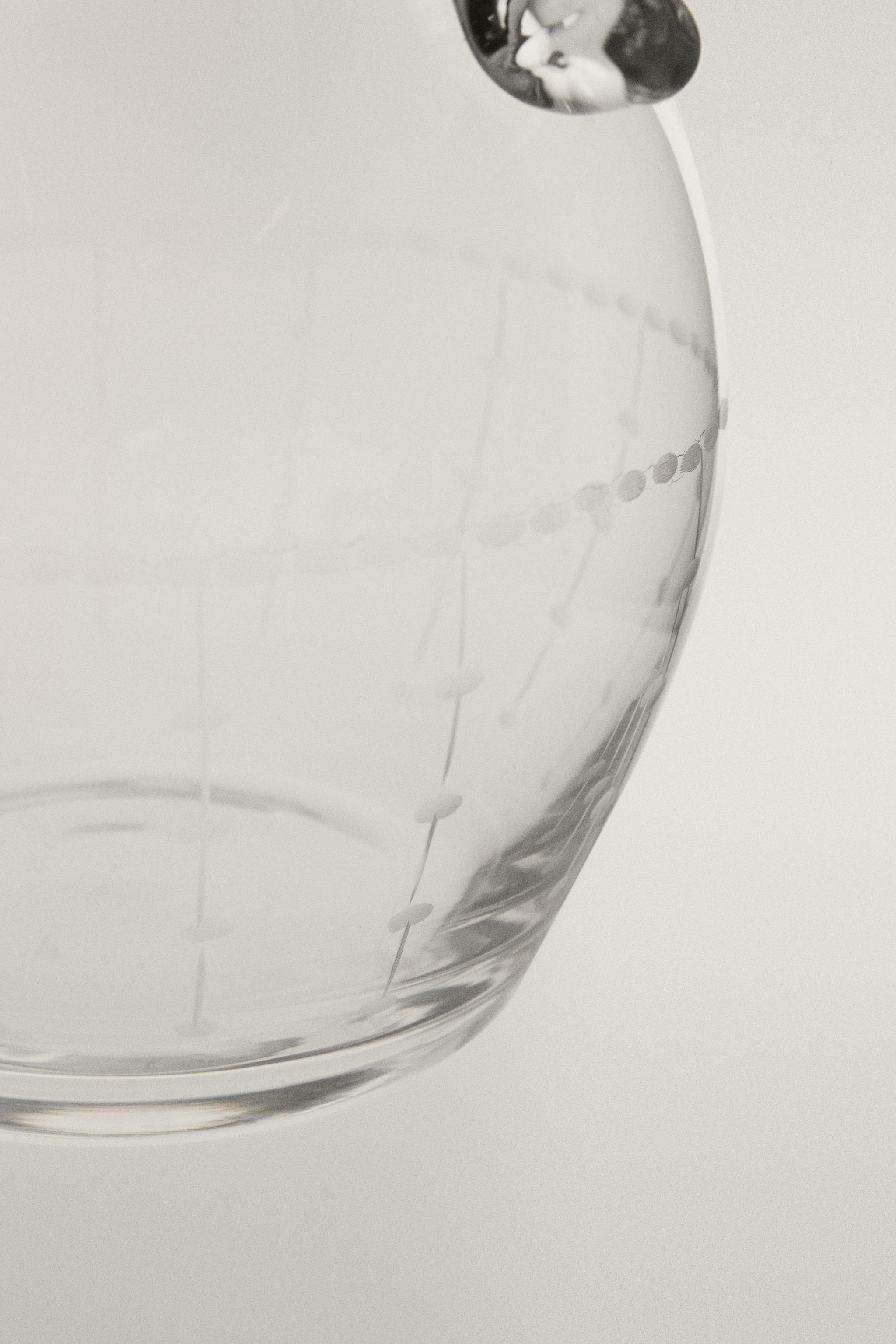 GEOMETRICALLY ENGRAVED GLASS PITCHER
