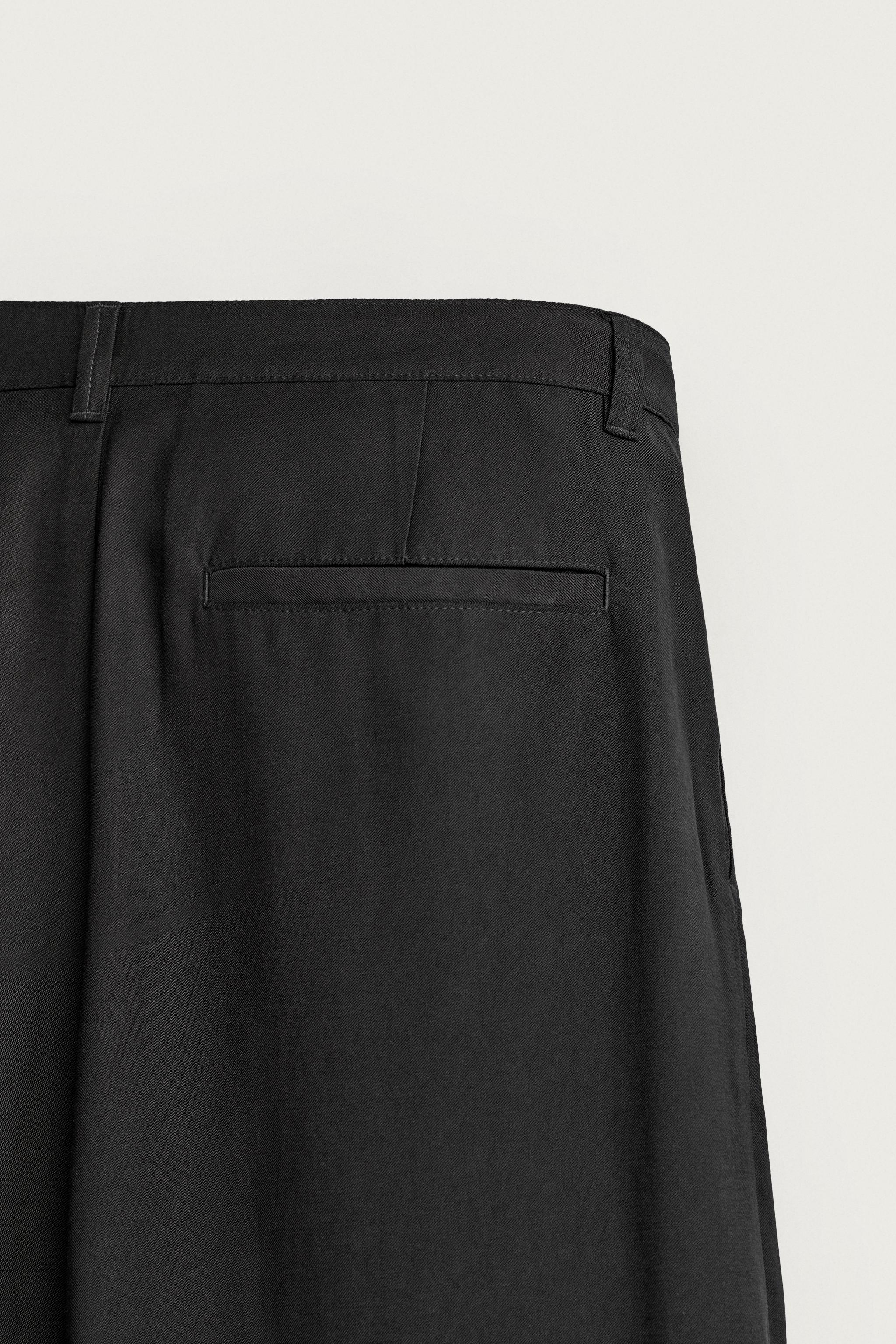 PLEATED FLUID TROUSERS