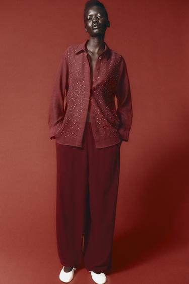 بنطلون كريب WIDE LEG - بورجندي الخاص بـ Zara