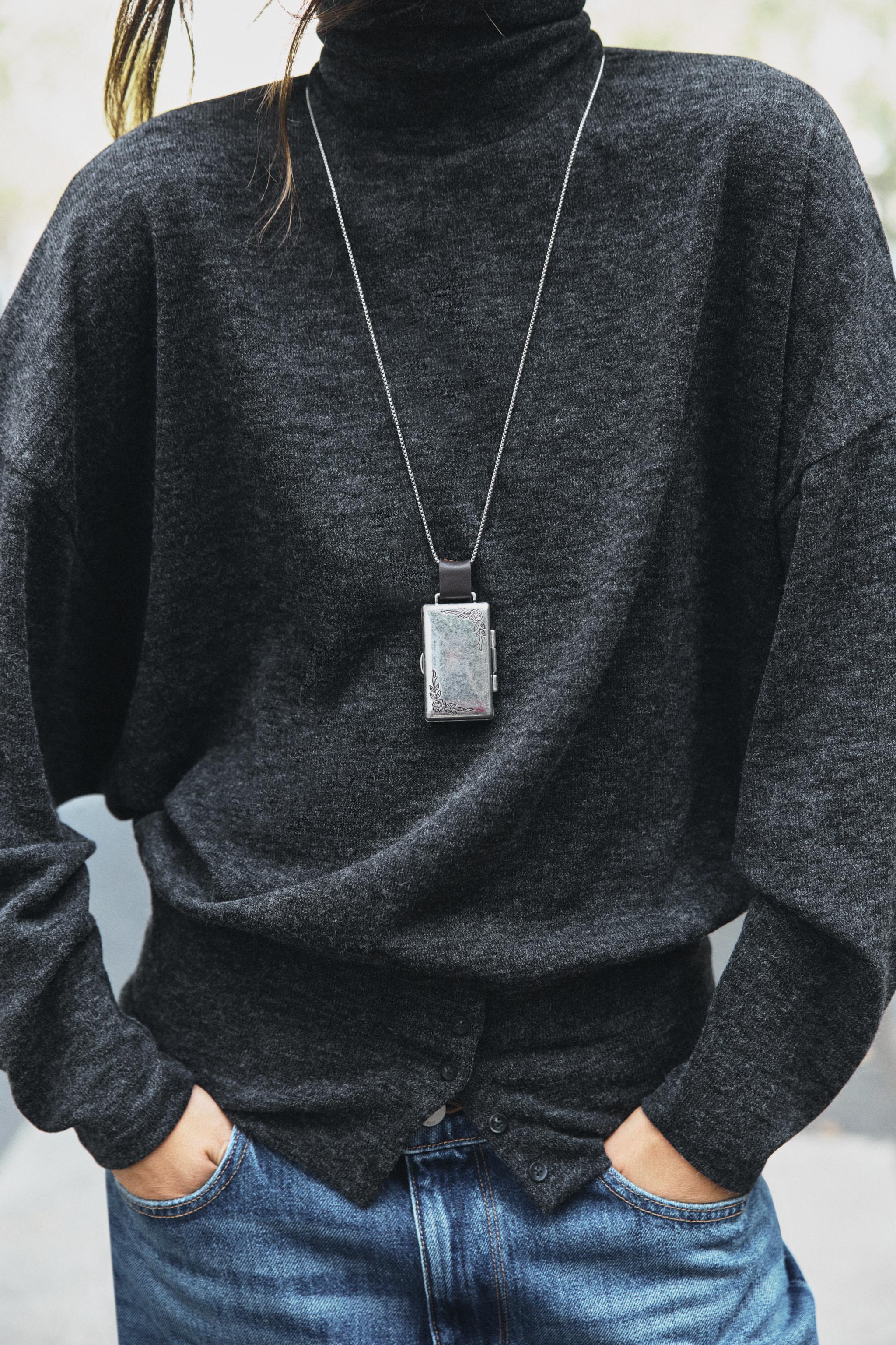 TOP OVERSIZE À BOUTONS