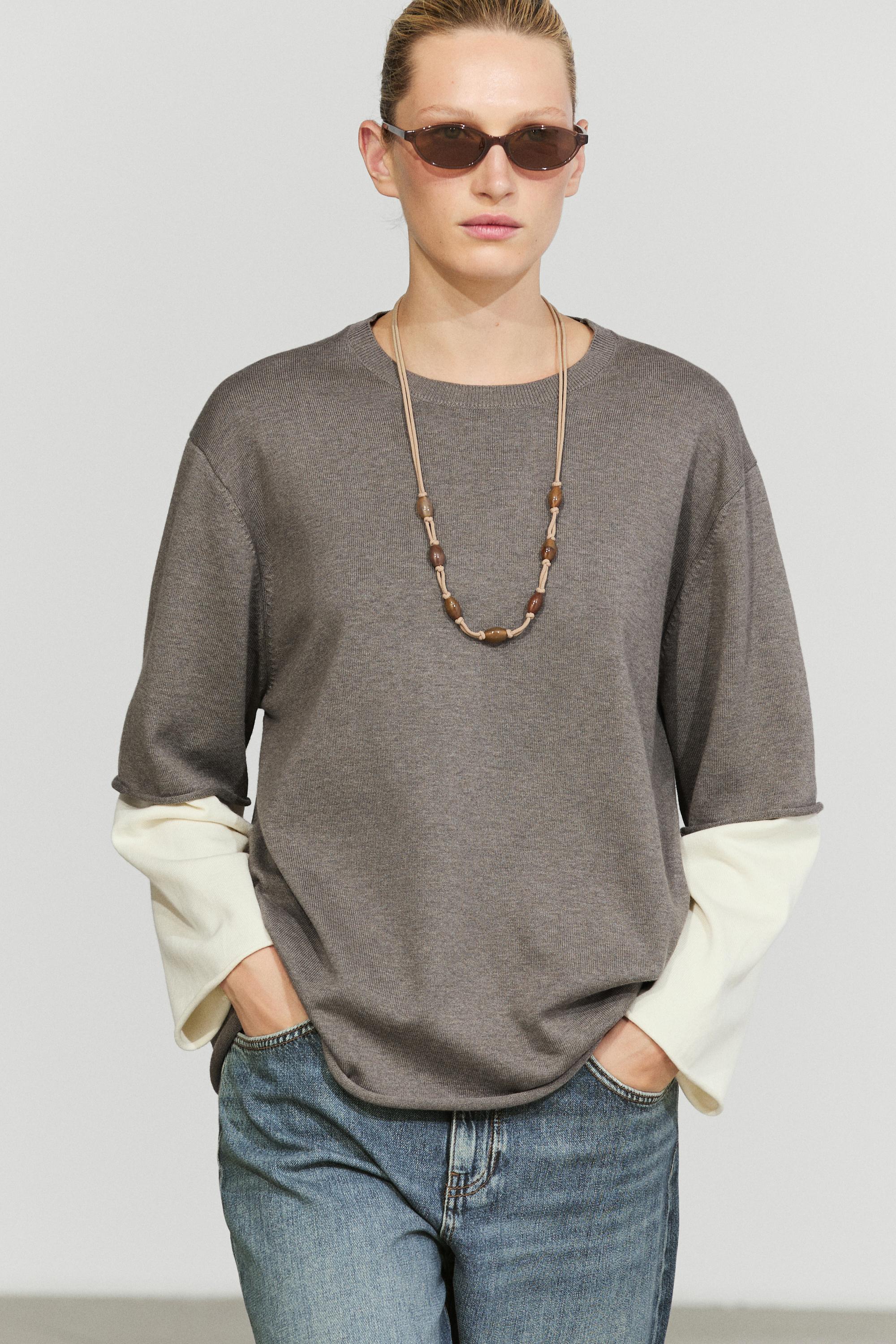 Oversize knit sweater with double sleeve detail