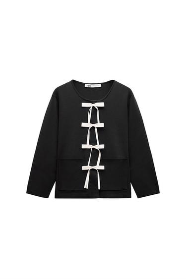 KNIT CARDIGAN WITH BOWS
