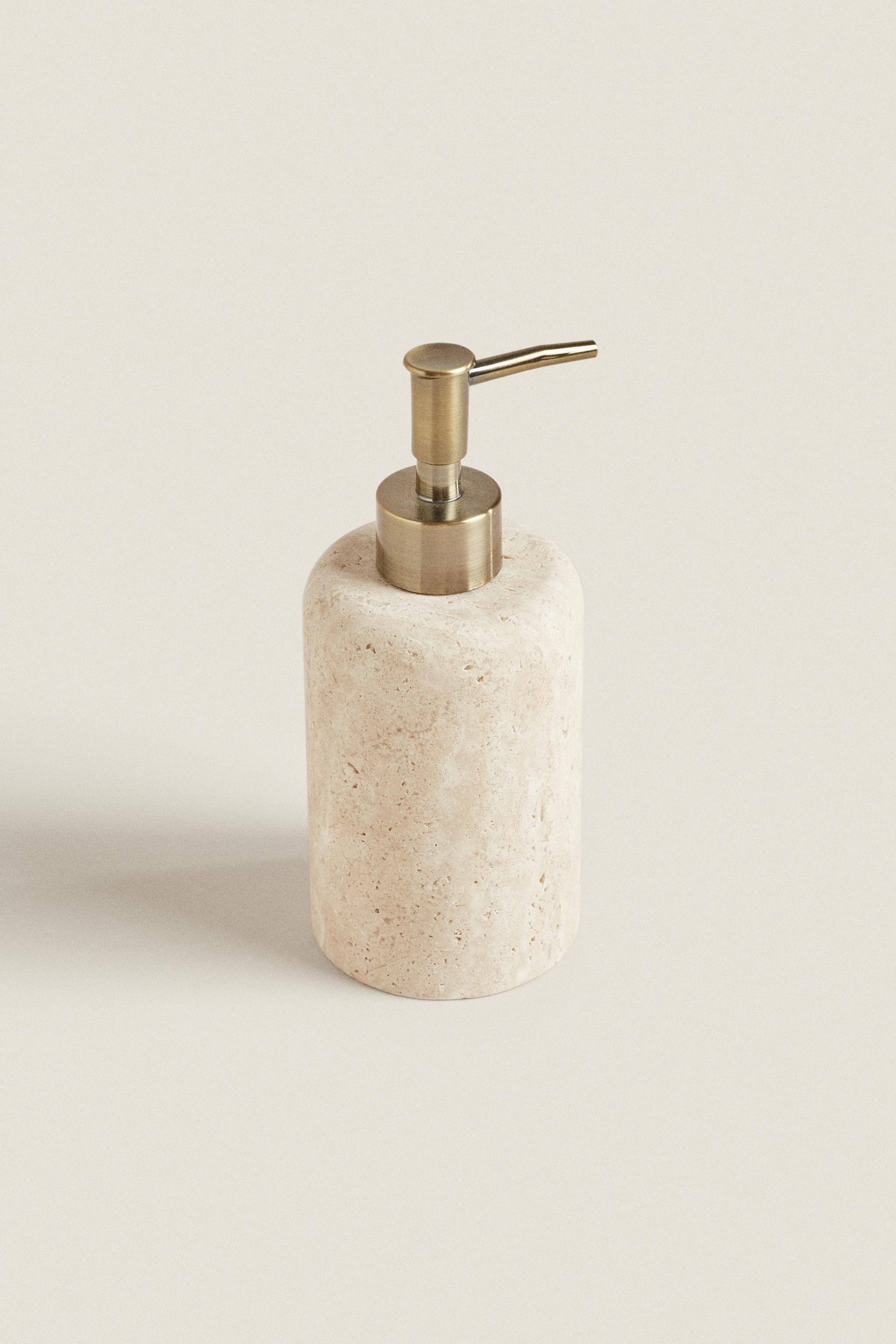 Marble soap clearance dispenser